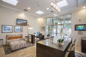 Pacific Plaza Hotels | Alameda, California | Lobby with front desk and seating area in Best Western hotel