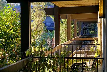 Pacific Plaza Hotels | Alameda, California | Balconies with black chairs